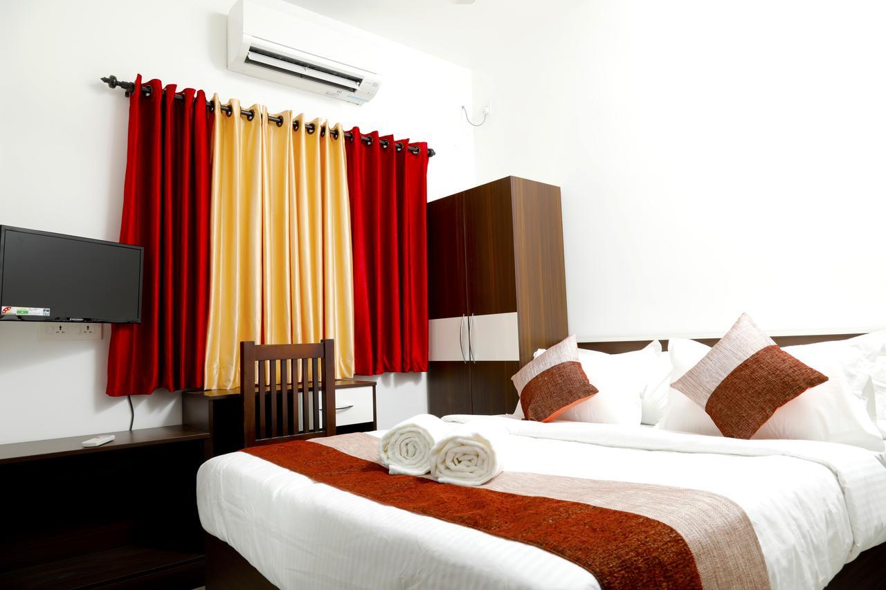 Puthens Clifton Inn Kottayam Luaran gambar