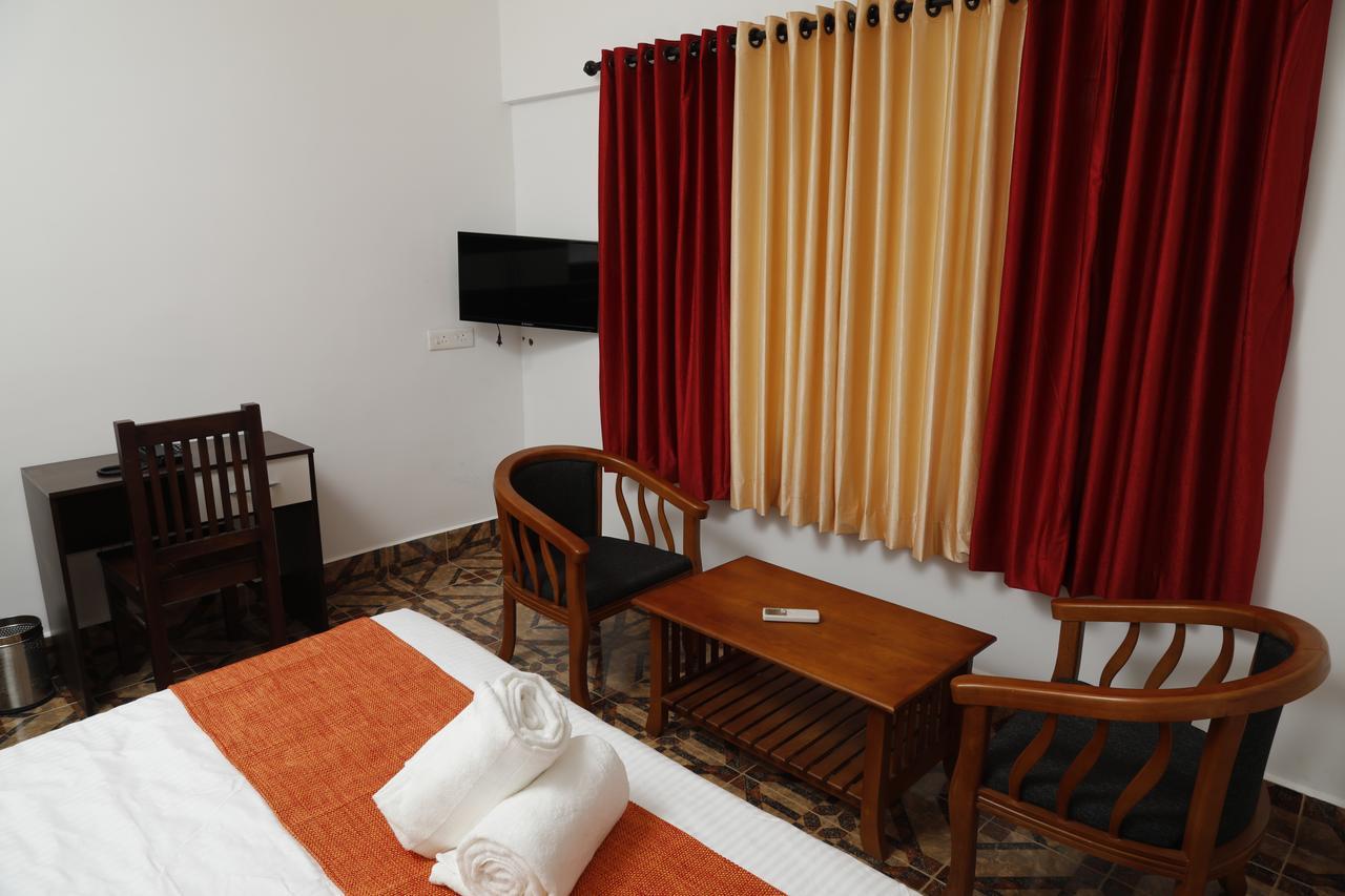 Puthens Clifton Inn Kottayam Luaran gambar