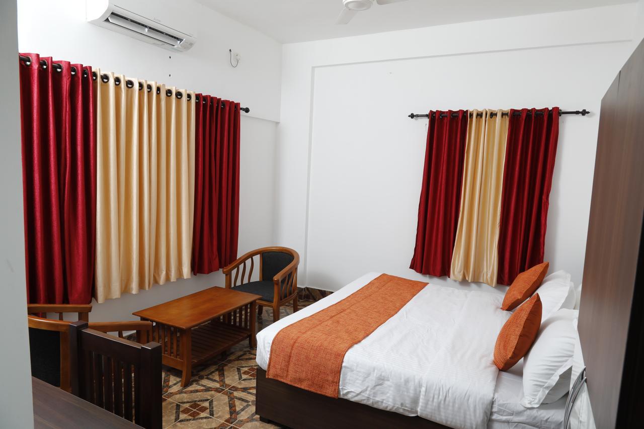 Puthens Clifton Inn Kottayam Luaran gambar